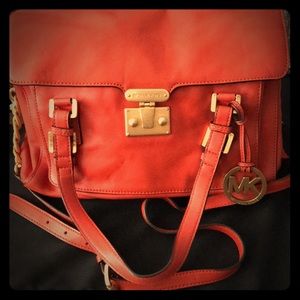 Authentic Michael Kors Orange small crossbody bag.